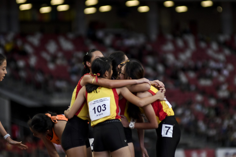 HCI share a moment after the A Div girls' 4x400m relay final. (Photo 1 © Iman Hashim/Red Sports)