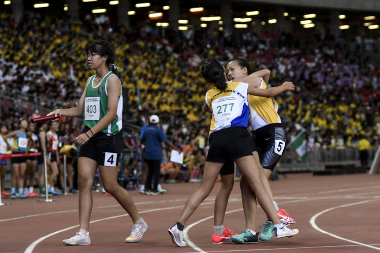 NYGH celebrate after the C Div girls' 4x400m relay final. (Photo 1 © Iman Hashim/Red Sports)